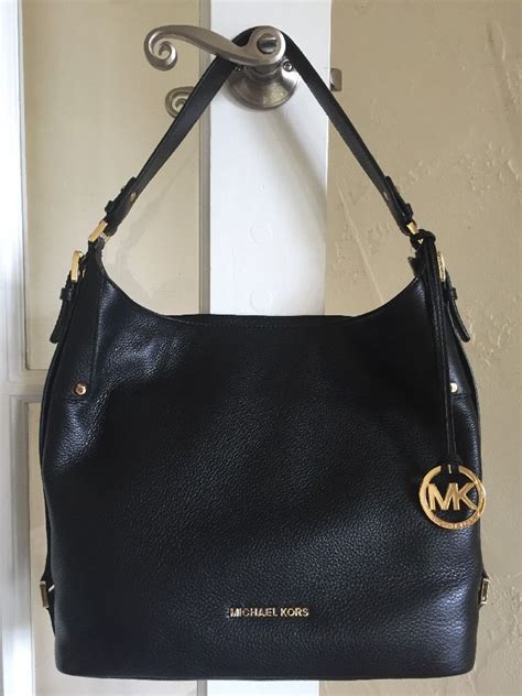 michael kors black purse 2014 style gold hardware|Michael Kors black shoulder purse.